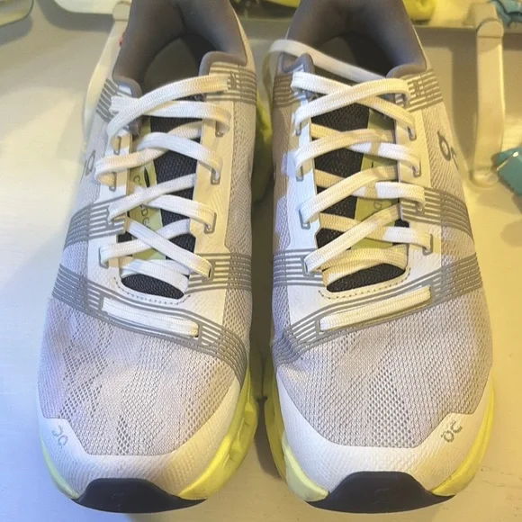On Running Light Gray and Soft Yellow Shoes